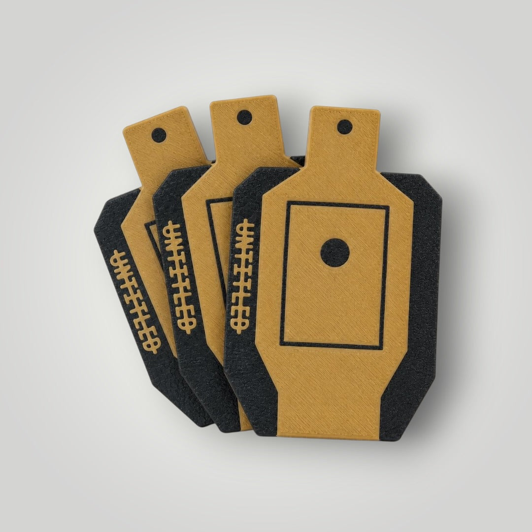 Three tan and black 3D Printed DryFire targets. 